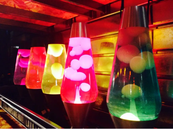 A row of colorful Lava Lamp displays, showing how temperature affects their flow speed.