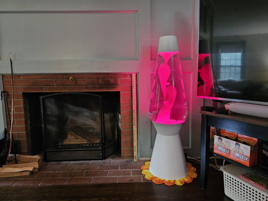 This pink lava lamp adds warm-season vibrancy, part of year-round color rotation.